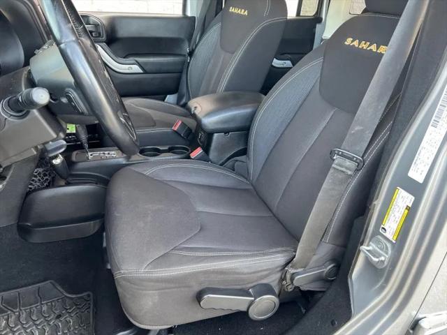 used 2013 Jeep Wrangler Unlimited car, priced at $9,550