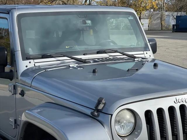 used 2013 Jeep Wrangler Unlimited car, priced at $9,550