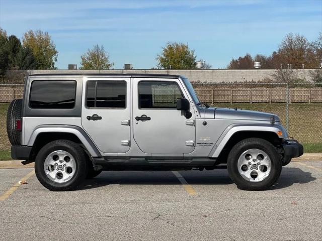 used 2013 Jeep Wrangler Unlimited car, priced at $9,550