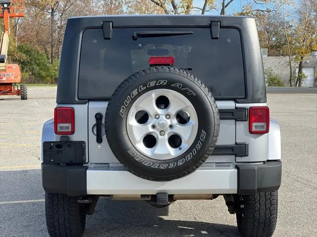 used 2013 Jeep Wrangler Unlimited car, priced at $9,550