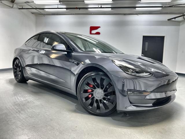 used 2022 Tesla Model 3 car, priced at $35,555