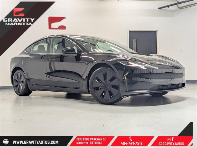 used 2024 Tesla Model 3 car, priced at $32,199