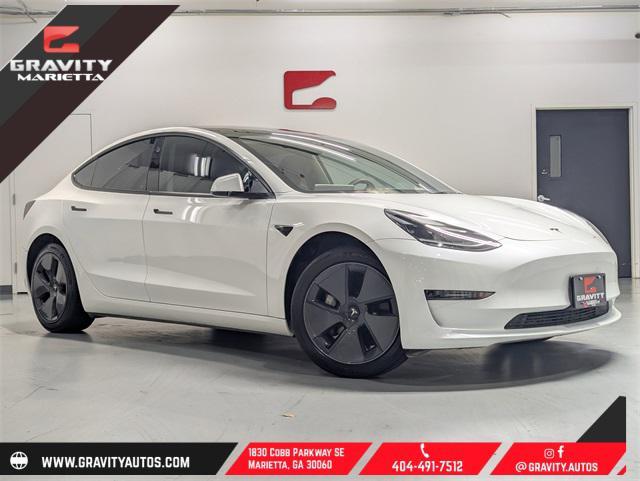 used 2023 Tesla Model 3 car, priced at $24,899