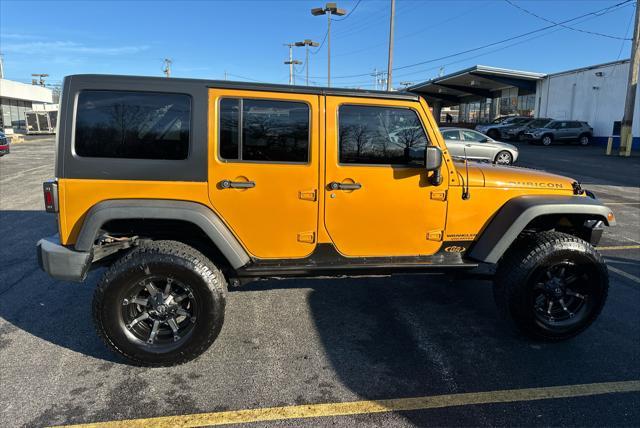 used 2014 Jeep Wrangler Unlimited car, priced at $23,995