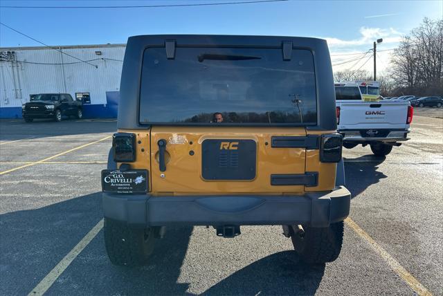 used 2014 Jeep Wrangler Unlimited car, priced at $23,995