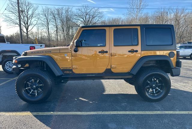 used 2014 Jeep Wrangler Unlimited car, priced at $23,995