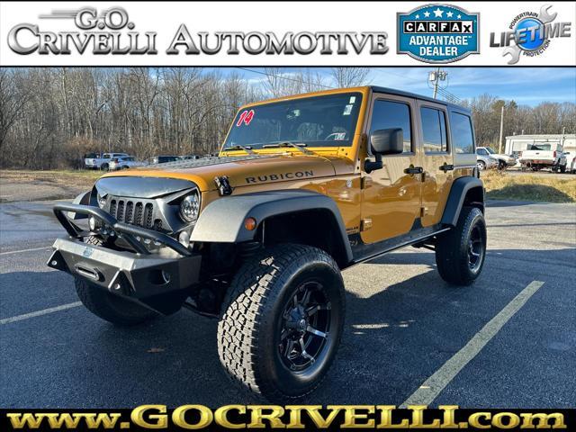 used 2014 Jeep Wrangler Unlimited car, priced at $23,995