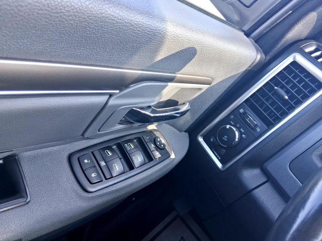 used 2018 Ram 1500 car, priced at $23,397