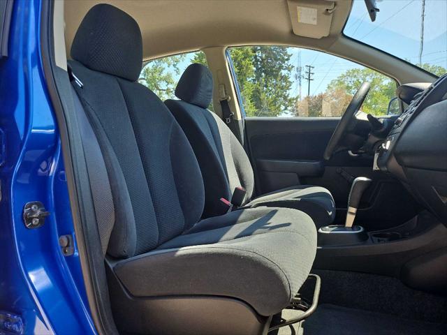 used 2011 Nissan Versa car, priced at $10,999