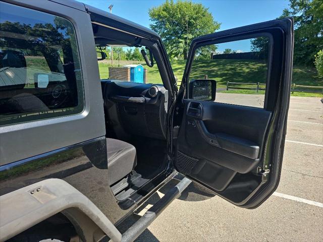 used 2015 Jeep Wrangler car, priced at $19,999