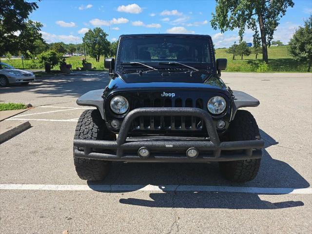 used 2015 Jeep Wrangler car, priced at $19,999