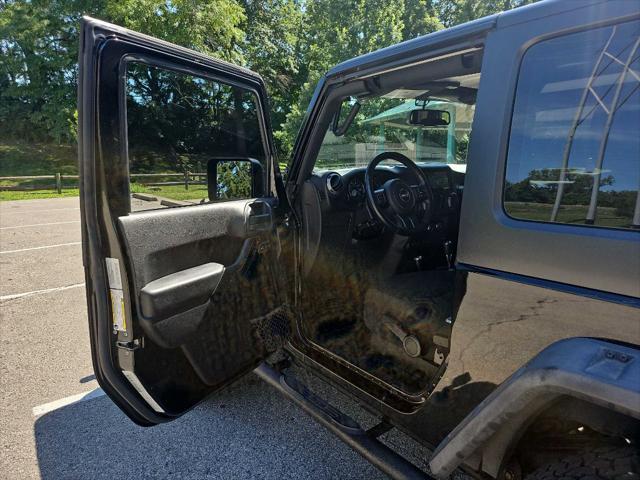 used 2015 Jeep Wrangler car, priced at $19,999