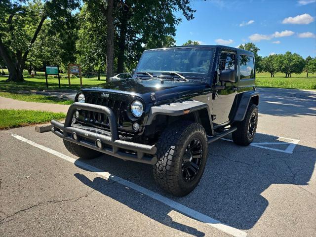 used 2015 Jeep Wrangler car, priced at $19,999