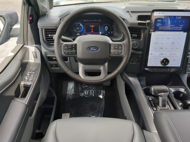 new 2025 Ford F-150 Lightning car, priced at $73,695