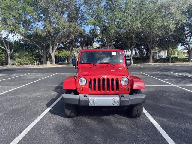 used 2012 Jeep Wrangler Unlimited car, priced at $18,255