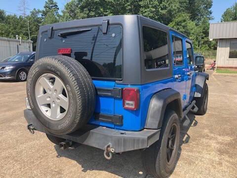 used 2011 Jeep Wrangler Unlimited car, priced at $12,995