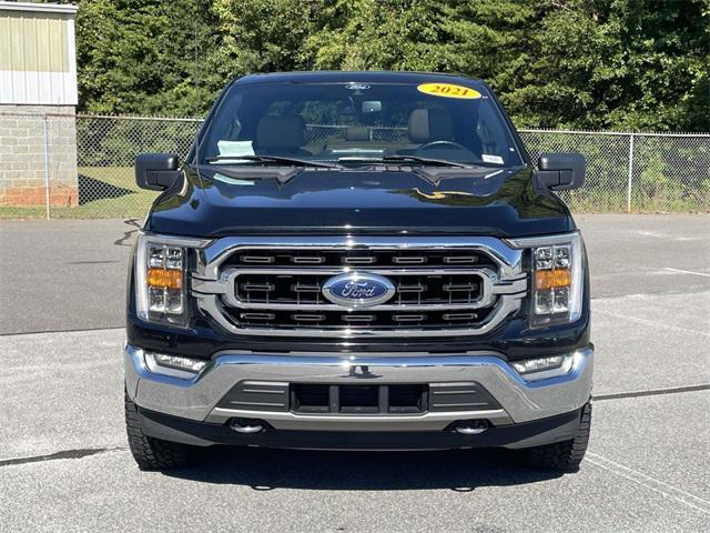 used 2021 Ford F-150 car, priced at $31,143
