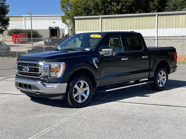 used 2021 Ford F-150 car, priced at $31,143