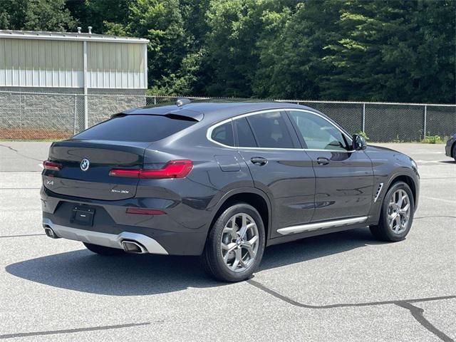 used 2023 BMW X4 car, priced at $42,816