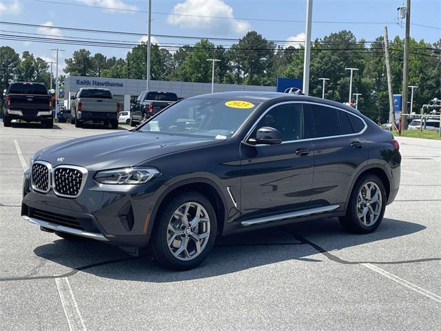 used 2023 BMW X4 car, priced at $42,816