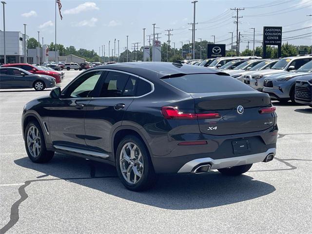used 2023 BMW X4 car, priced at $42,816
