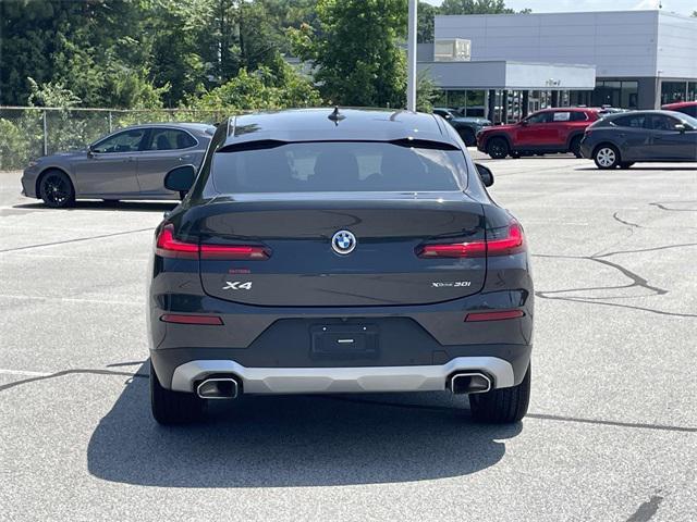 used 2023 BMW X4 car, priced at $42,816