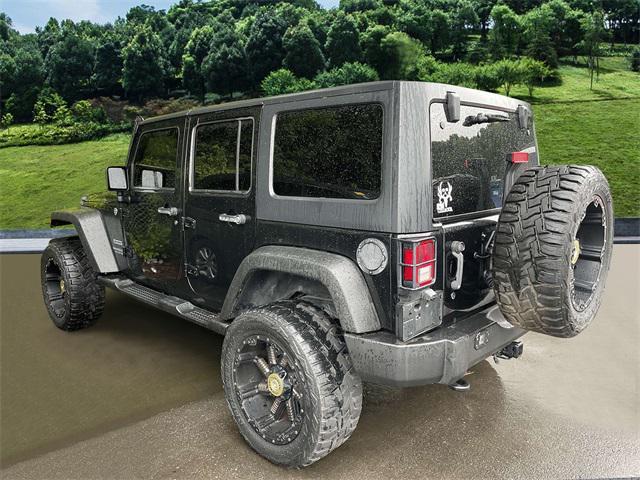 used 2014 Jeep Wrangler Unlimited car, priced at $17,499