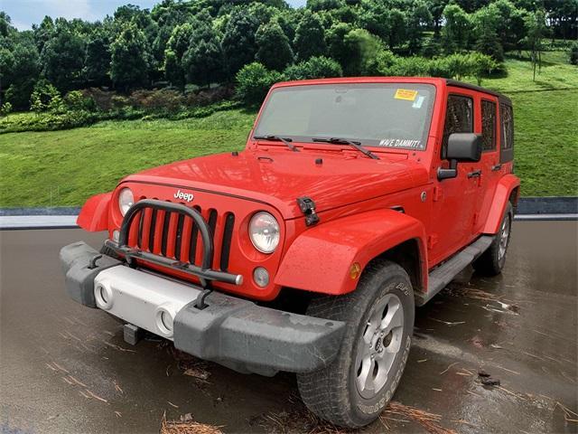 used 2015 Jeep Wrangler Unlimited car, priced at $18,679