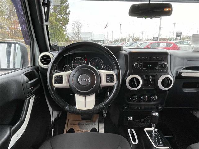 used 2013 Jeep Wrangler Unlimited car, priced at $11,599