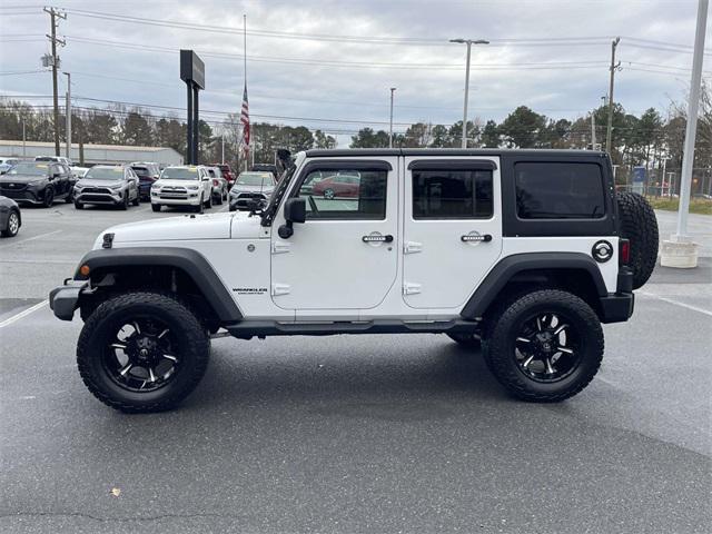 used 2013 Jeep Wrangler Unlimited car, priced at $11,599