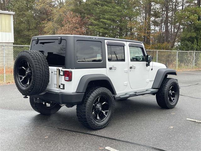 used 2013 Jeep Wrangler Unlimited car, priced at $11,599