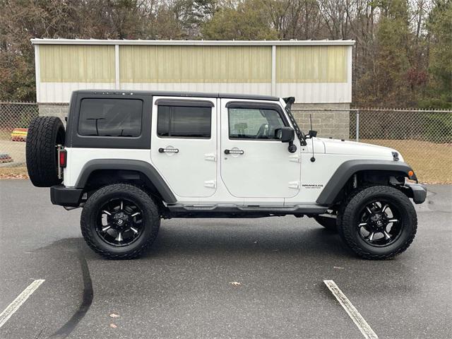 used 2013 Jeep Wrangler Unlimited car, priced at $11,599