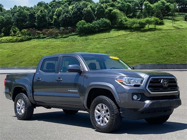 used 2018 Toyota Tacoma car, priced at $26,028
