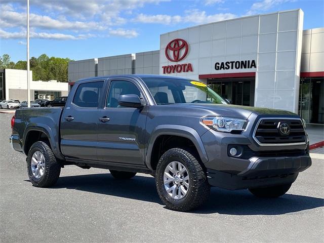 used 2018 Toyota Tacoma car, priced at $26,028