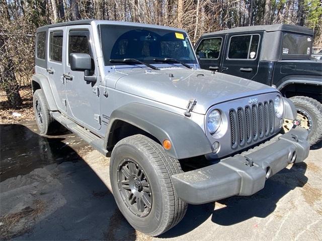 used 2015 Jeep Wrangler Unlimited car, priced at $16,911