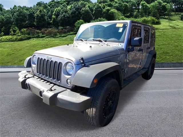 used 2015 Jeep Wrangler Unlimited car, priced at $16,911