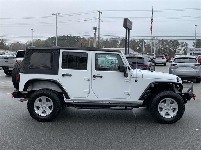 used 2015 Jeep Wrangler Unlimited car, priced at $14,618