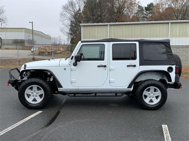 used 2015 Jeep Wrangler Unlimited car, priced at $14,618