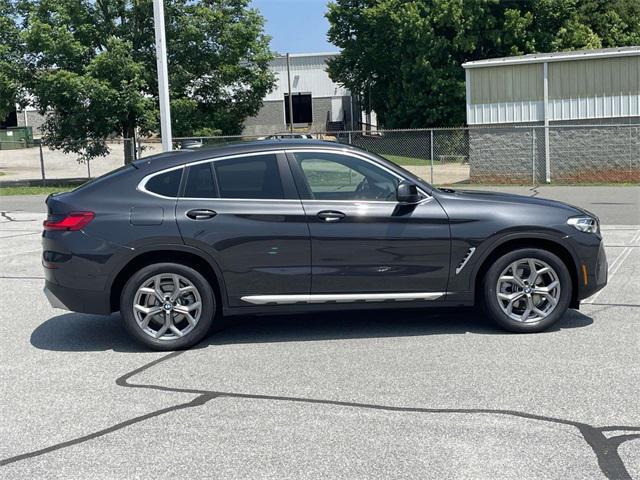 used 2023 BMW X4 car, priced at $41,928