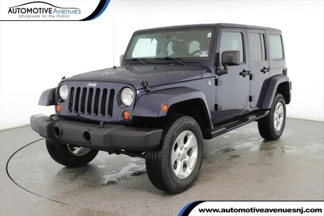 used 2013 Jeep Wrangler Unlimited car, priced at $12,495