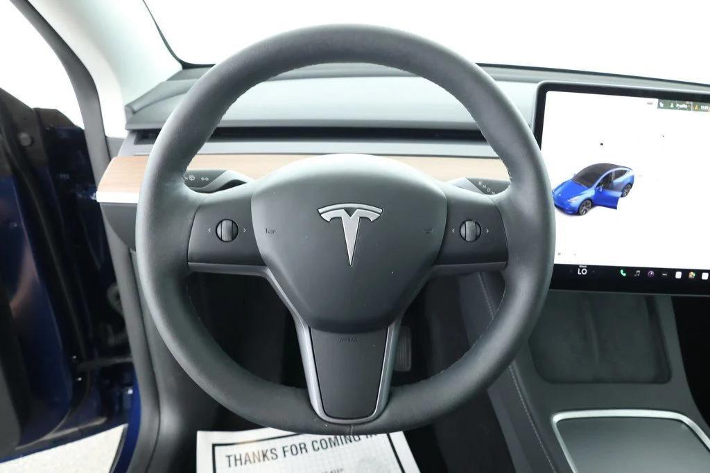 used 2025 Tesla Model Y car, priced at $34,995
