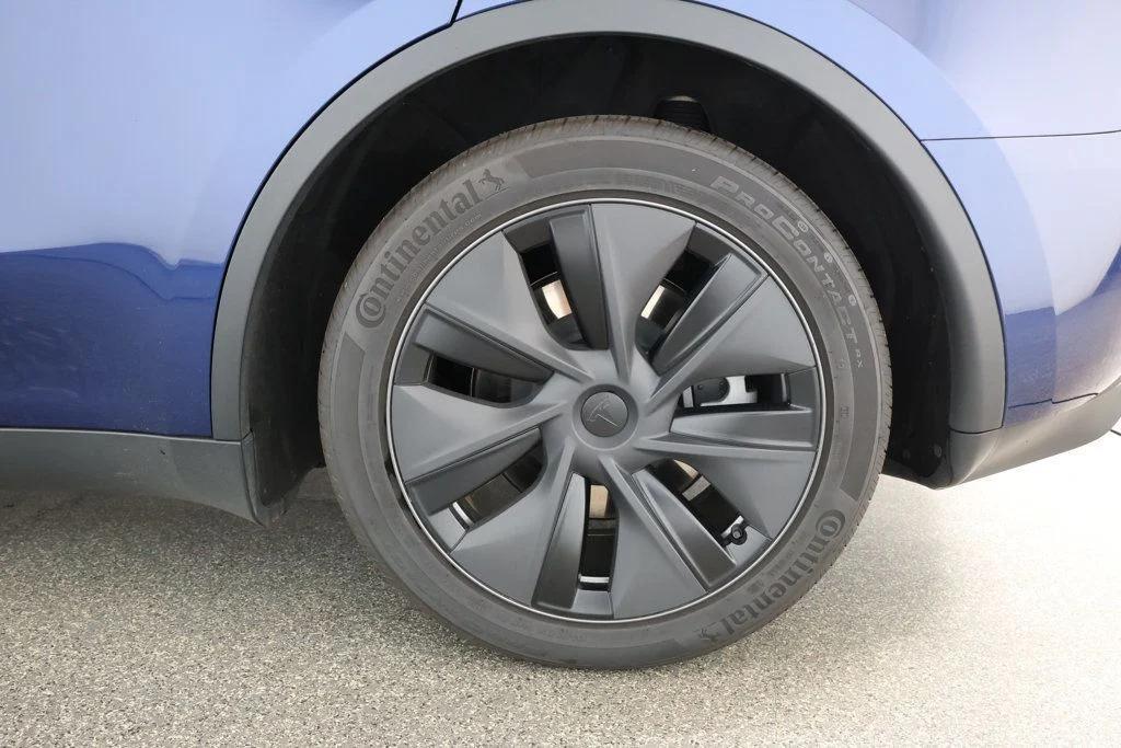 used 2025 Tesla Model Y car, priced at $34,995