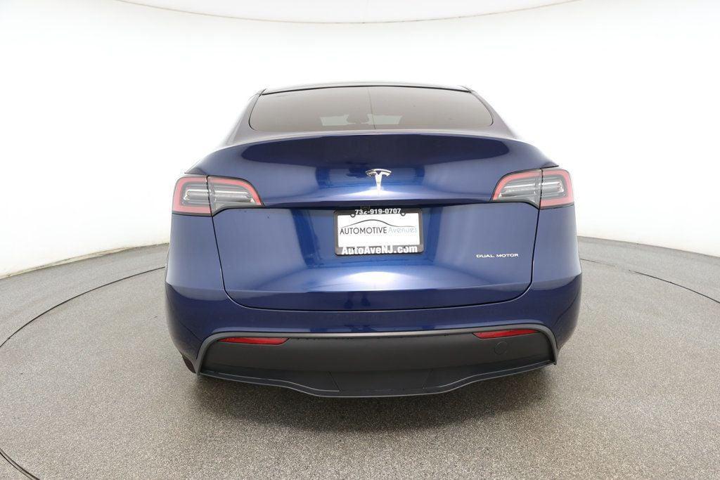 used 2025 Tesla Model Y car, priced at $34,995