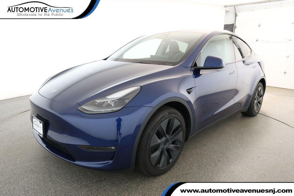used 2025 Tesla Model Y car, priced at $34,995