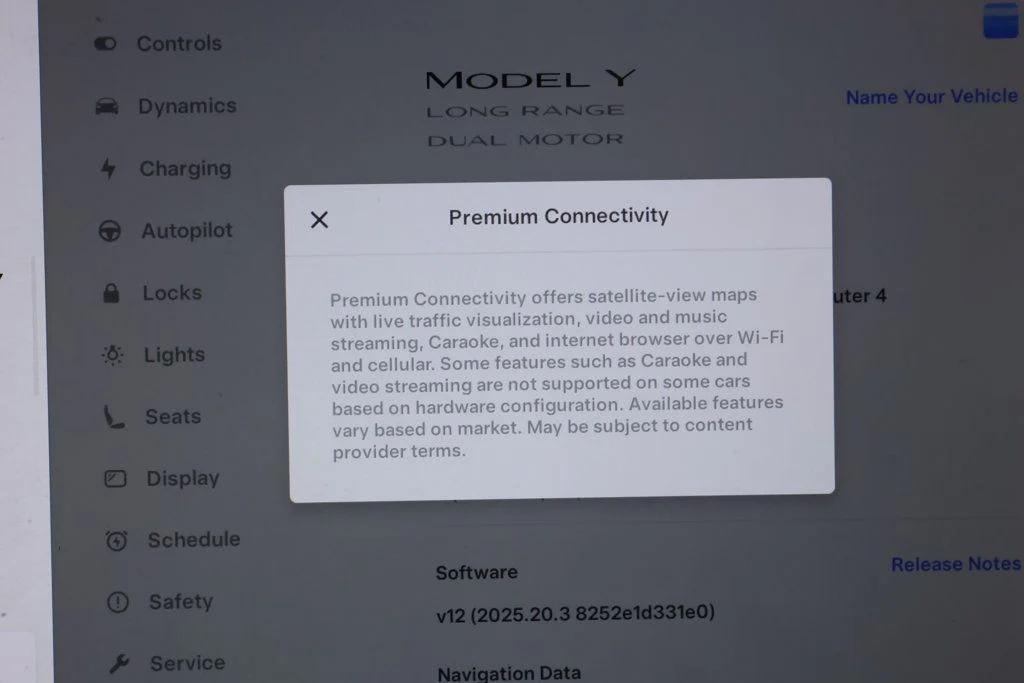 used 2025 Tesla Model Y car, priced at $34,995