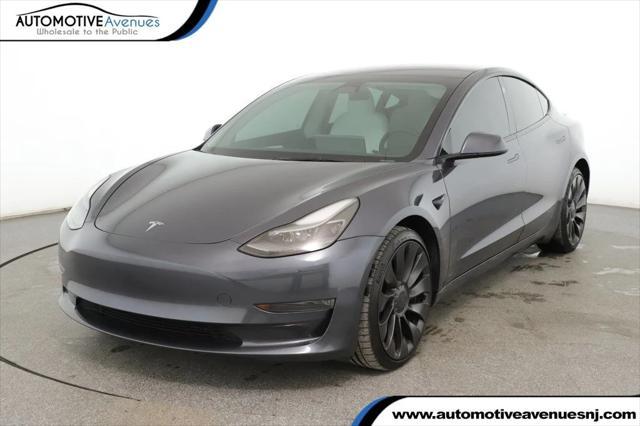 used 2023 Tesla Model 3 car, priced at $32,495