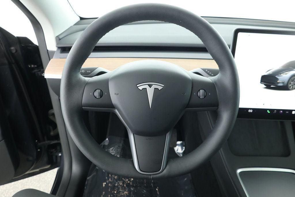 used 2024 Tesla Model Y car, priced at $32,995