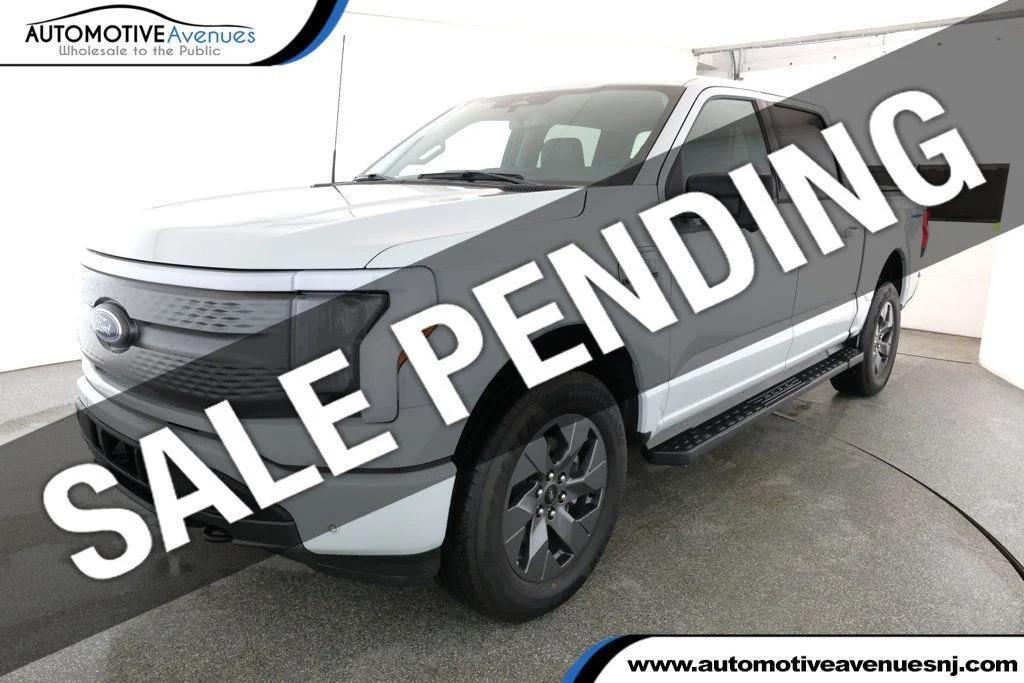 used 2023 Ford F-150 Lightning car, priced at $38,995
