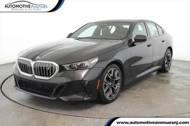 used 2024 BMW i5 car, priced at $57,795