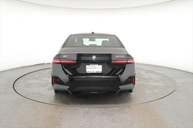 used 2024 BMW i5 car, priced at $57,795
